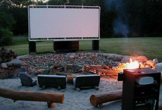outdoor movie screen, made with PVC pipes, tethers, and a white tarp. It's f