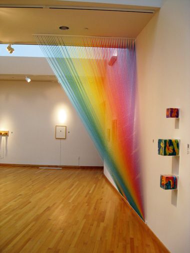 rainbow installations done with sewing thread