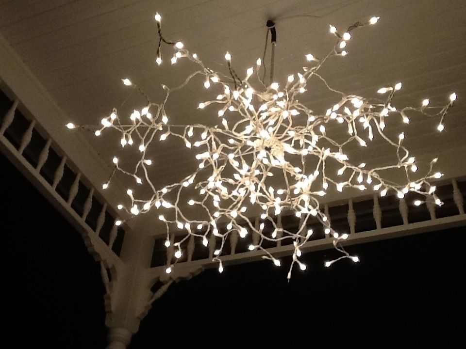 umbrella frame and white lights for the back porch