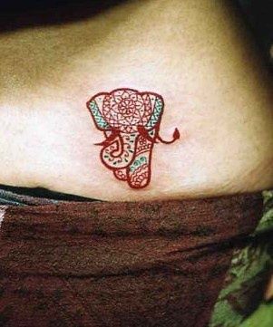 very unique and cute elephant #tattoo on the lower back
