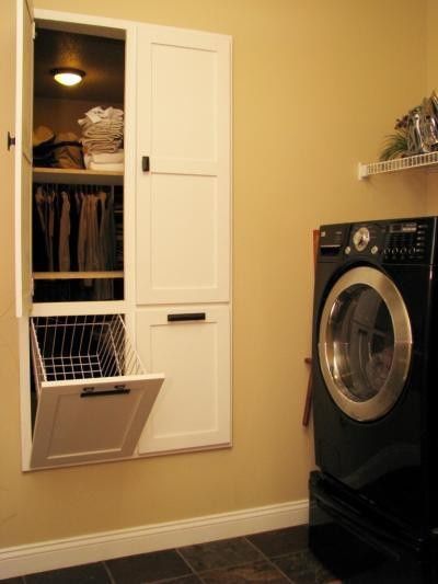 A laundry room next to the master bedroom. The hamper goes into the master close