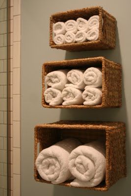 Baskets. A way to keep bath linens close to the shower, and not taking up closet
