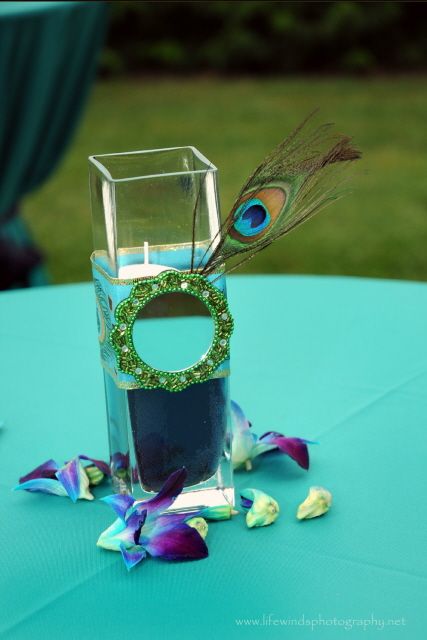 DIY peacock themed wedding arrangements using Pier 1 Mini Flower Mirrors
