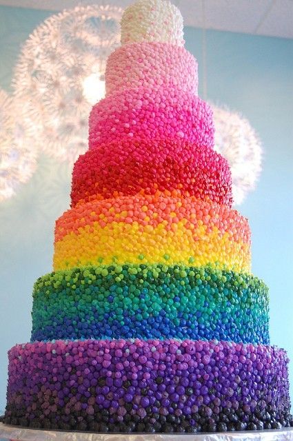 Incredible rainbow wedding cake, crafted with thousands of tiny frosting dots. C