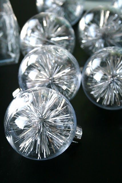 Made from extra tinsel and clear balls. make them small so they can hang deep in