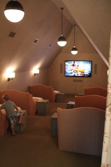 Movie theater in the attic with lounge/beds