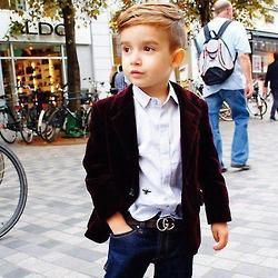 Okay, admit it. This little dude dresses better than you.