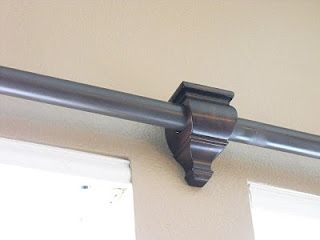 Paint PVC pipe for curtain rods! Finish off with finials and brackets. Holy cash