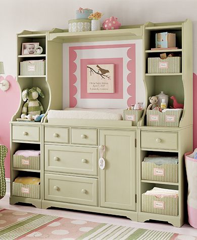 clever! An entertainment center turned into a changing table. TONS of space