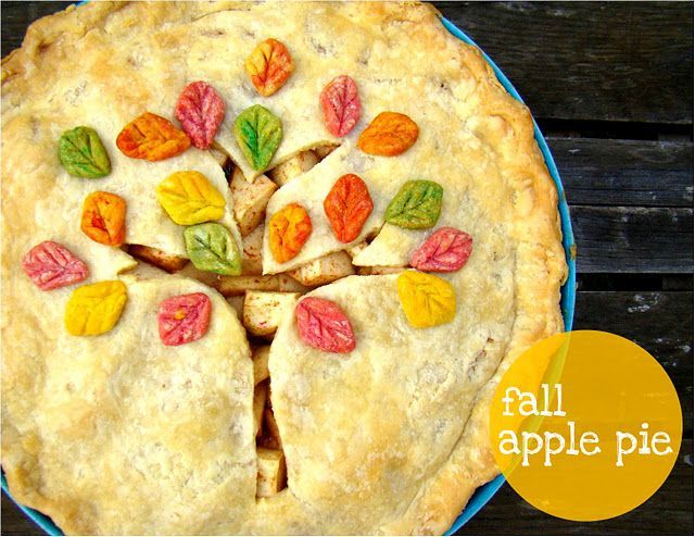 Festive Fall Apple Pie with a tree and leaves in all the fall colors to decorate