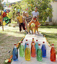 Great Idea! Fill plastic bottles with colored water for lawn bowling! Drop in a