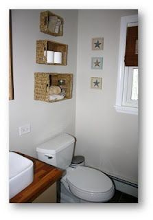 Hang baskets in the bathroom for extra shelving!