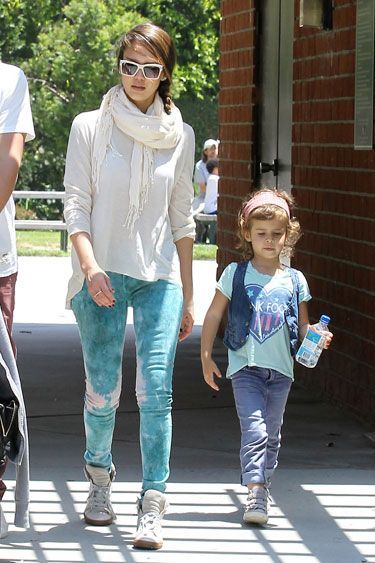 Jessica Alba's ditches her blue jeans for this trendy tye-dye option