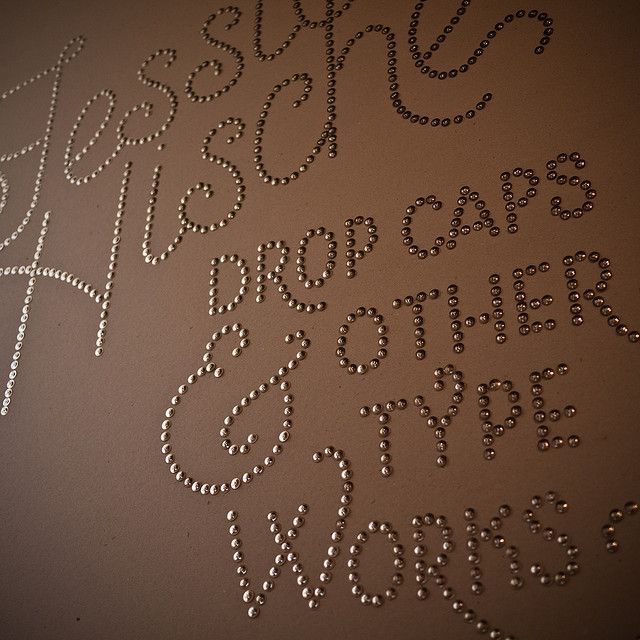 Words made with thumb tacks on the wall.  I AM doing this!!
