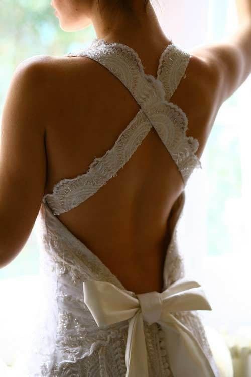 ooooh.  crisscrossed low back wedding dress