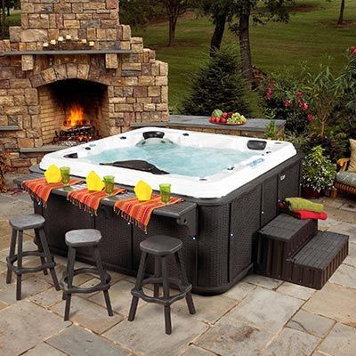 A hot tub with a bar counter. Amazing idea.