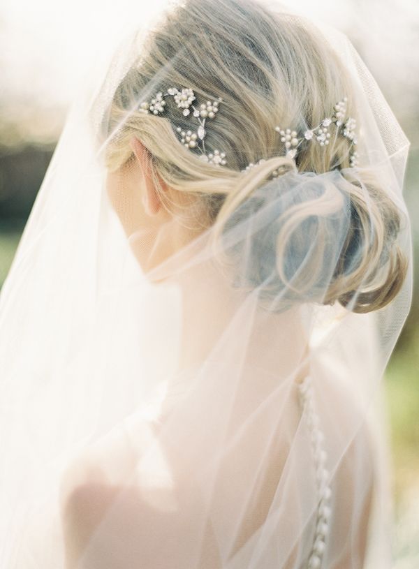 Wedding Hairstyles with Drop Veil via once wed