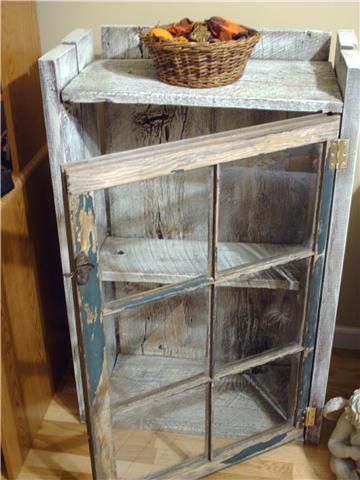 Amazing site!   This is made of old barn boards and and antique window.  Buy the