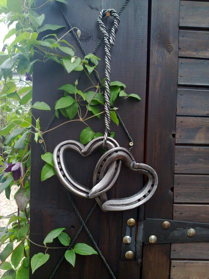 Old horseshoes made into hearts and hung