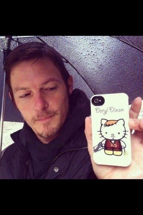 Walking Dead's Darryl Dixon displays his Hello Kitty Phone.