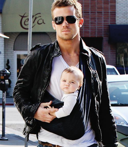 hot guy with a bebe