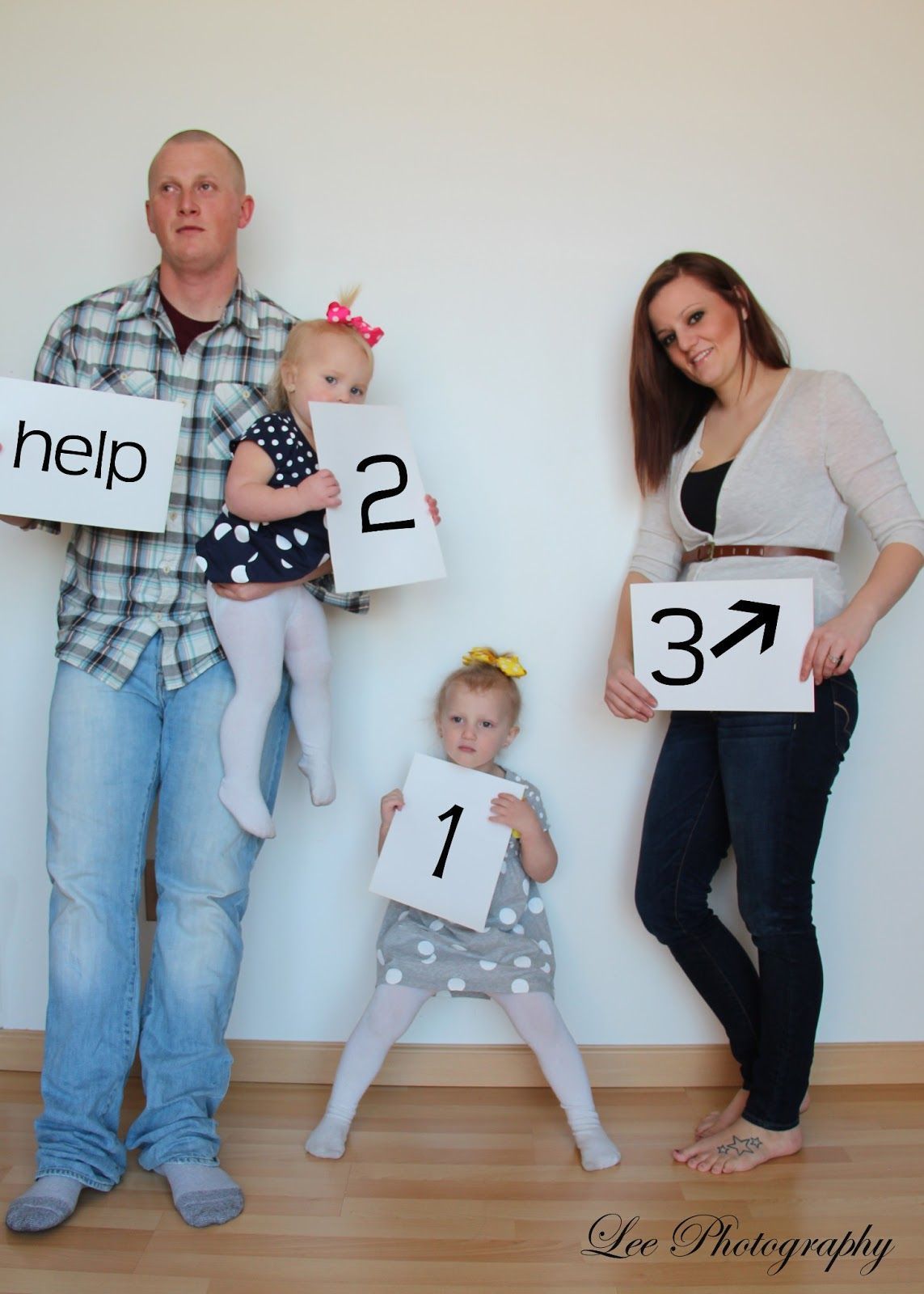 1, 2, 3, Help.  Pregnancy reveal, baby number 3 photography idea