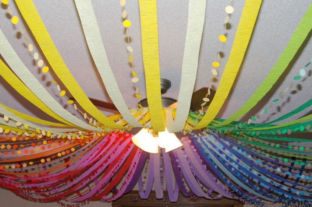 Attach streamers to a hula hoop and hang.