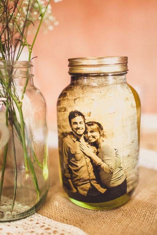 Black and white pics in mason jar.. OMG!!! I love these for the table centerpiec
