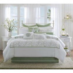 Decorating a beach themed bedroom starting with beach bedding. Several decoratin