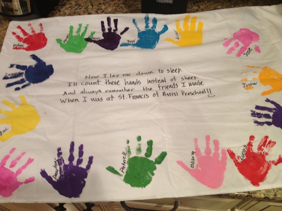 Pillowcase with hand prints of classmates – should do this for a retirement gift