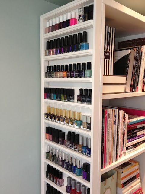 This blogger built a nail polish storage rack by adding strips of wood trim to t