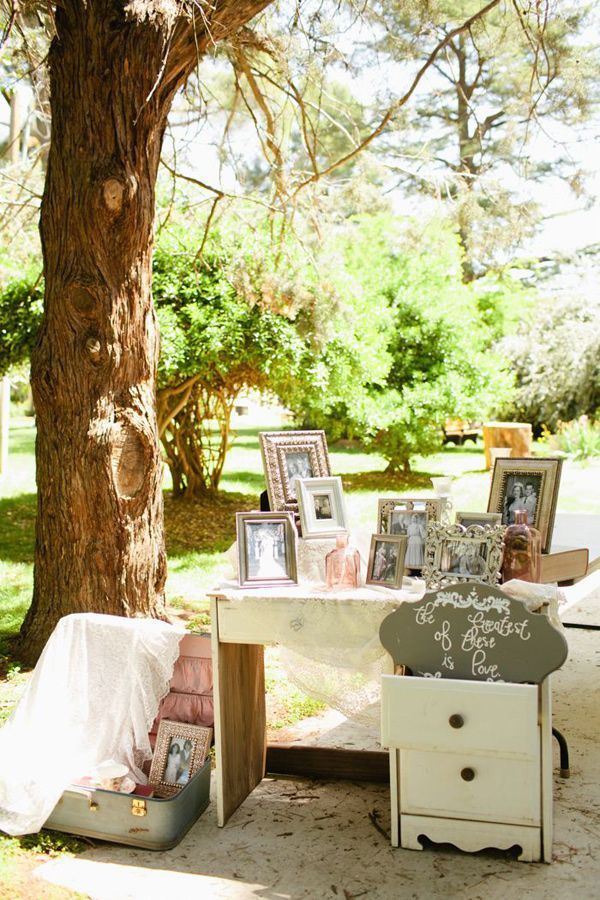 Vintage Wedding Decor. –I love all the different photo frames with different ph