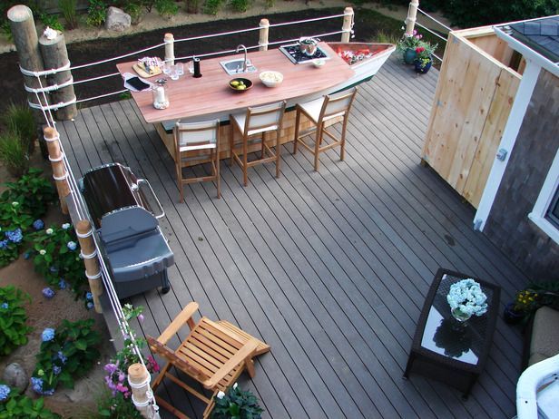 Awesome nautical inspired deck design, I am loving the rope railing!  I was thin