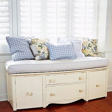 Cut the legs off an old dresser, add a cushion – instant bench..