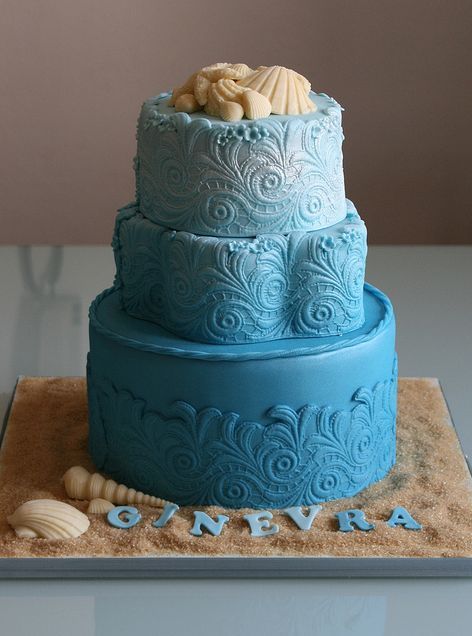 Holy smokes. Minus the beach-y-ness, this would be a pretty amazing wedding cake