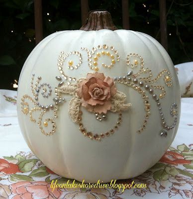 If I were having a Cinderella party I might take a large pumpkin and do this as