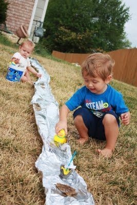 Tin Foil River in the yard. Fun! its the little things they love … cheap fun!