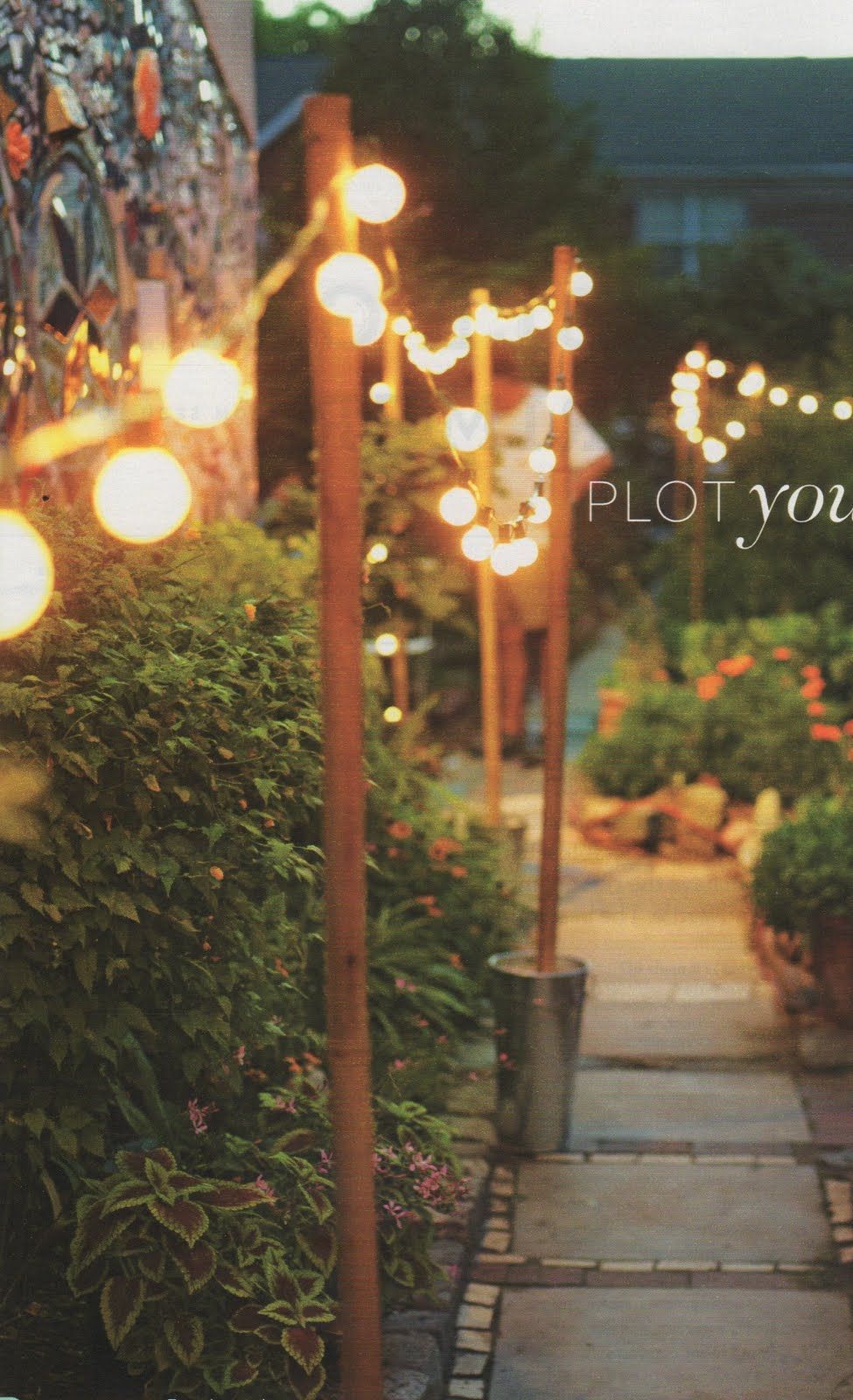 Use sand filled buckets and wooden posts to string lights around your reception