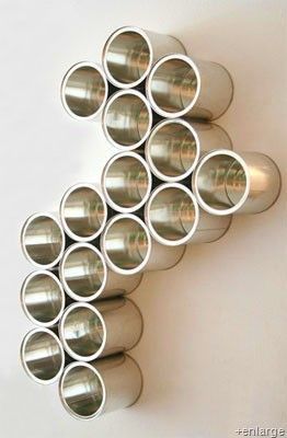 these cans are used as art but I think it would make really fun craft room stora