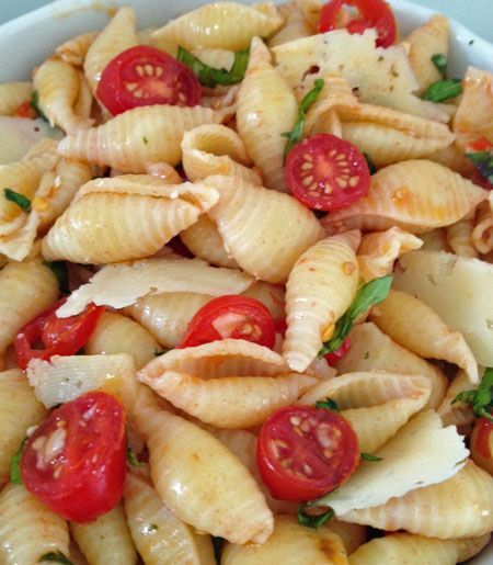One of our favorite Spring/Summer dishes: Seashell pasta salad with basil, tomat