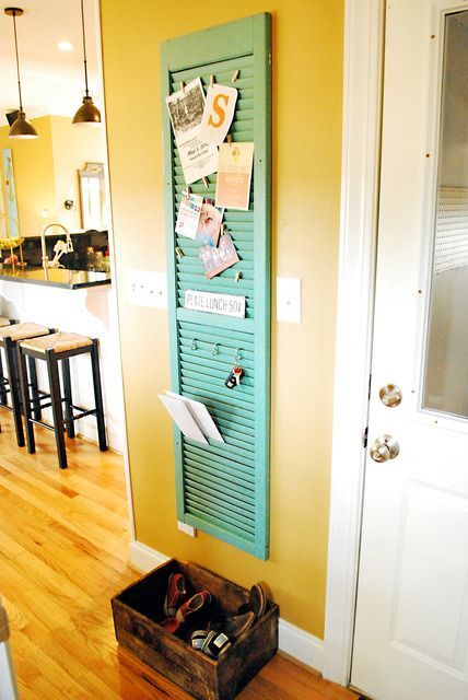 Shutter – clothespins for invites and mail, and hooks for keys.