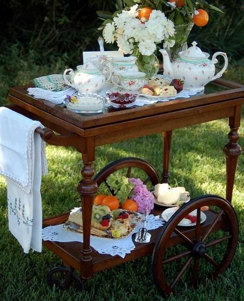 Rolling tea party cart. I want a tea cart in my nook or dining!!