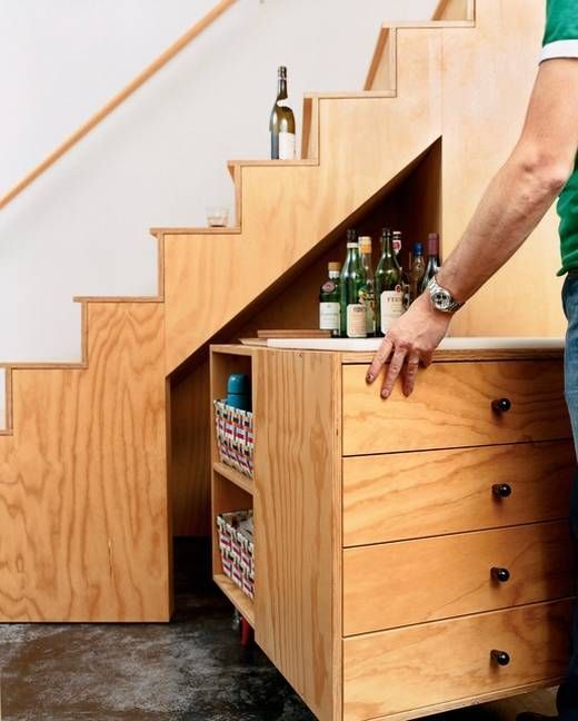 30 Ideas To utilize Space Under Stair : Wine Storage With Slide Shelves Under St