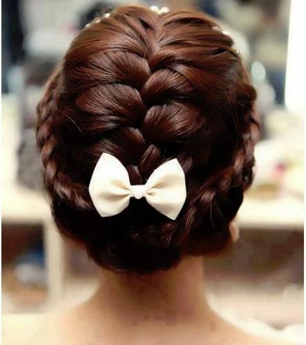 braided crown accented with a white small bow. I would wear this every single da
