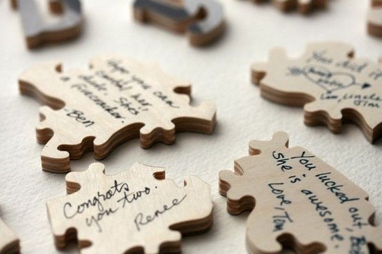 cute guest book idea – have each guest sign a puzzle piece, put puzzle together