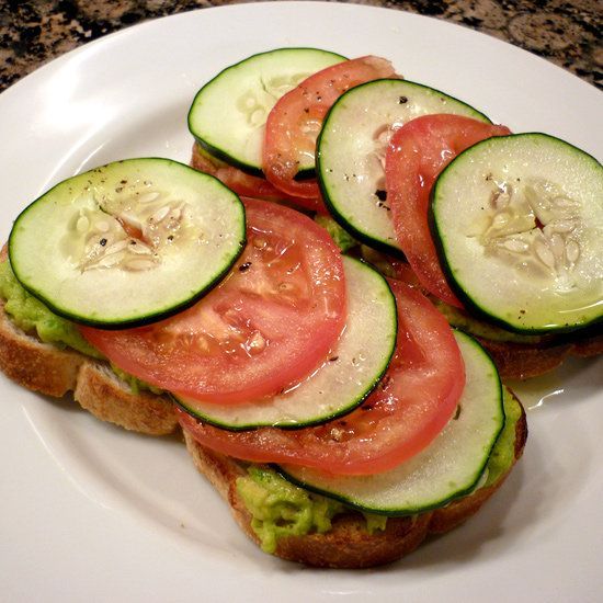 Mash avocado with a little feta cheese, spread it on wheat bread, and top with s