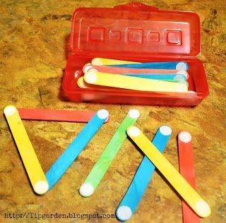 DIY Toddler Activities – craft sticks and Velcro dots… “Busy bag” okay weird.