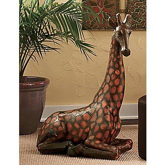 Giraffe statue for home decor.  I own this Giraffe and named her Tillie.  She is