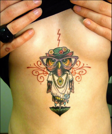 Granny owl tattoo….Hahaa dont know if Id want this on my stomach in between br