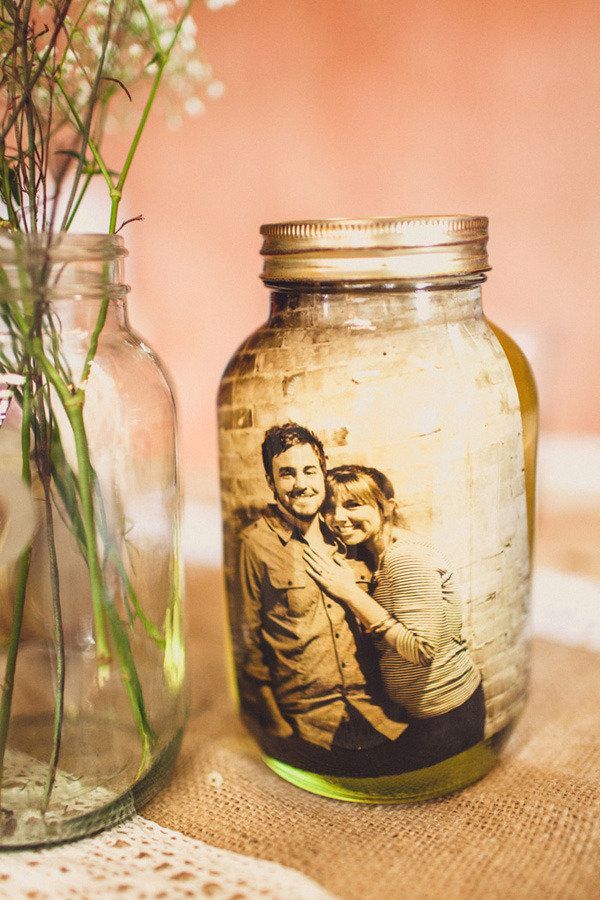 laminate sepia pictures and put in mason jars of water